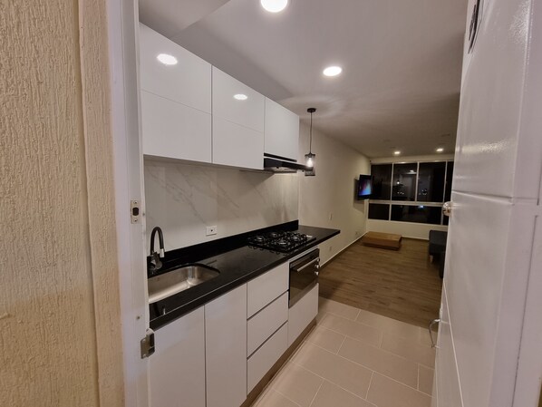 Fridge, microwave, oven, stovetop