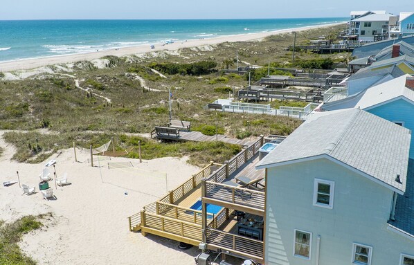 On the beach, sun loungers, beach towels