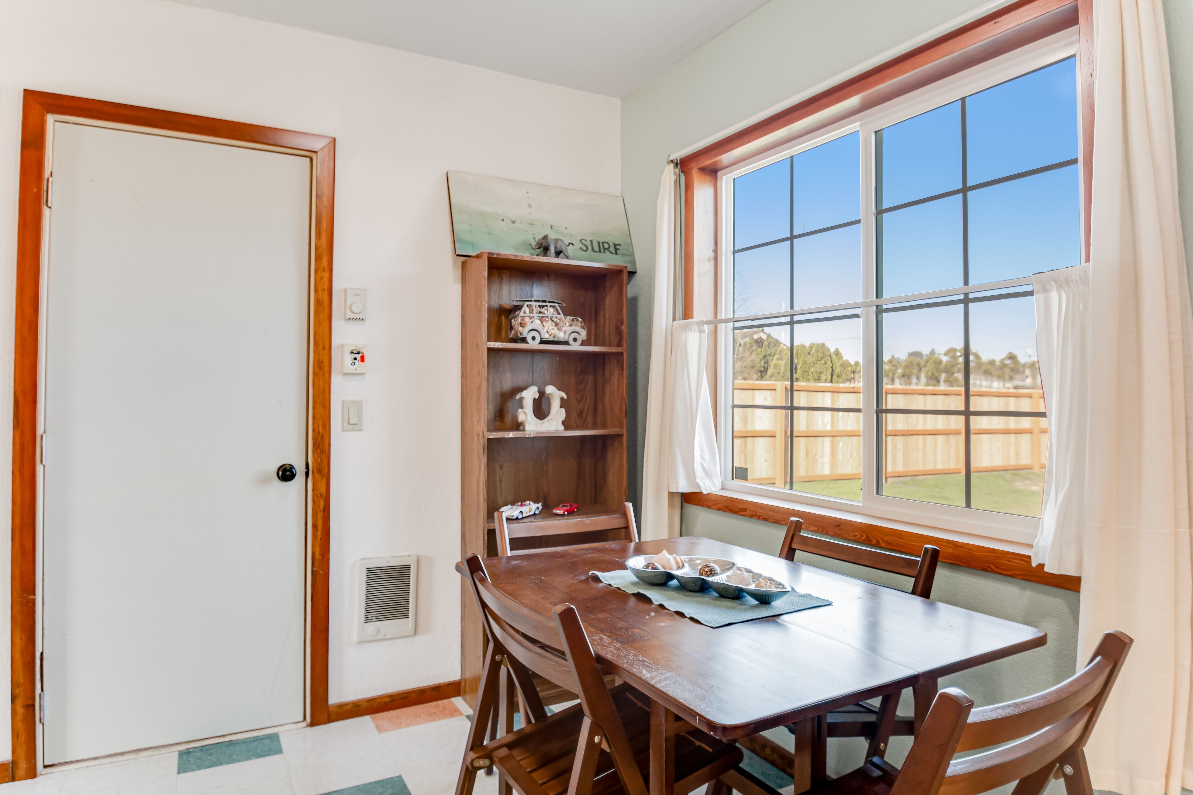 Downtown home with private hot tub & WiFi - walk to beach - dog-friendly yard