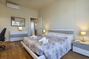 2 bedrooms, desk, iron/ironing board, travel cot