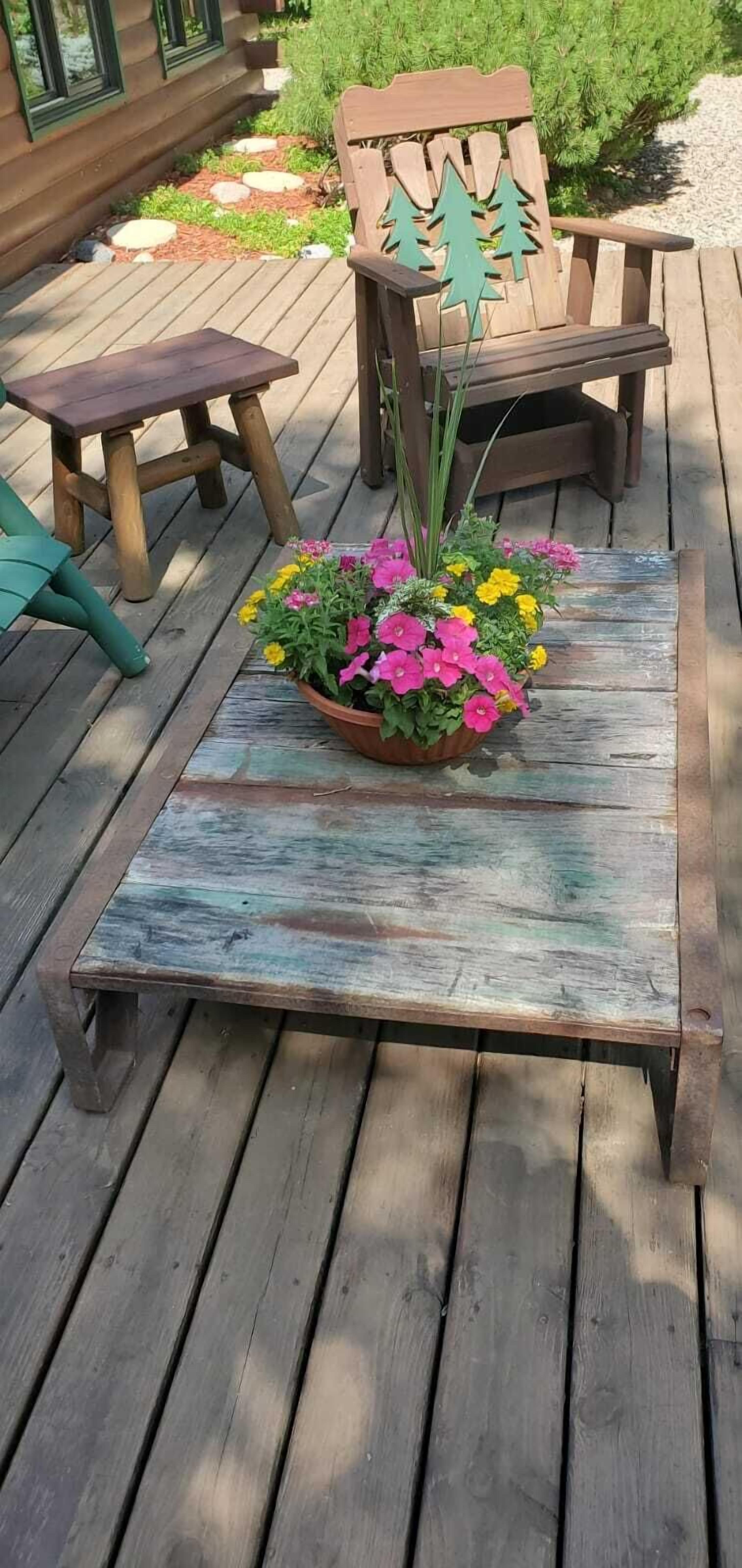 Relax on the deck overlooking the lake and bonfire pit.