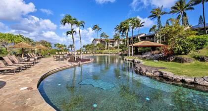 Two-level condo with AC, lanai, 2 pools & 8 tennis courts - walk to beach
