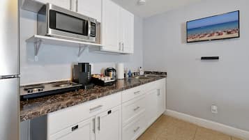 Fridge, microwave, stovetop, coffee/tea maker