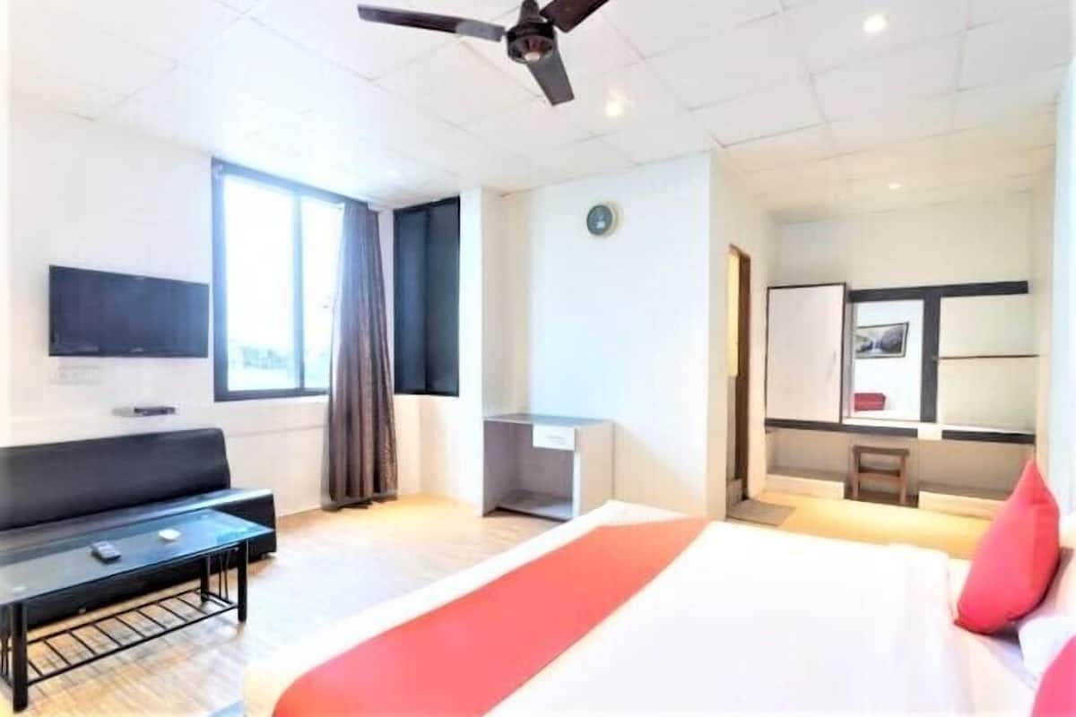 Habitación Deluxe | Camas extra y ropa de cama