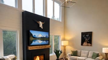 Älytelevisio, takka, videopelejä, pöytäjalkapallopöytä