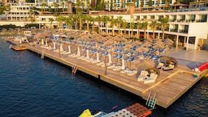Private beach, white sand, free beach cabanas, sun loungers