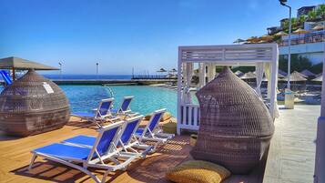 Private beach, white sand, free beach cabanas, sun loungers