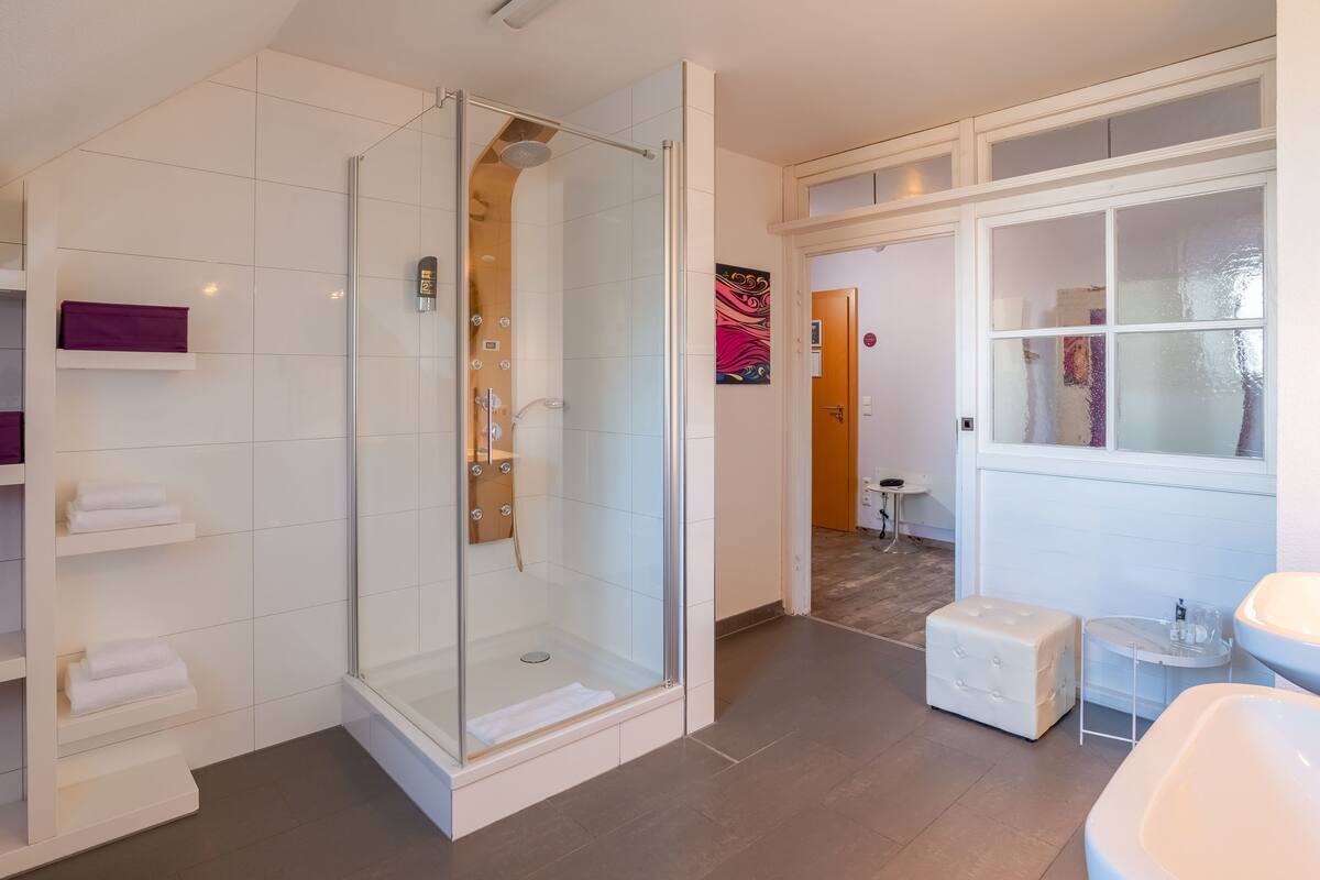 suite | bathroom | shower, towels