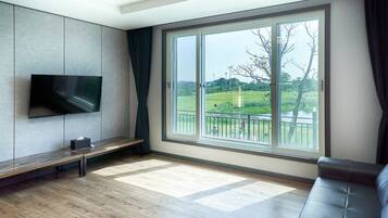 Village Type President (No Cooking Allowed) | Living area | 55-inch LED TV with digital channels, TV, heated floors