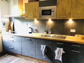 Fridge, microwave, dishwasher, coffee/tea maker