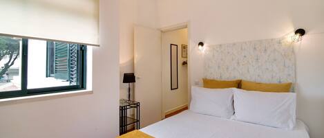 1 dormitorio, tabla de planchar con plancha, wifi gratis y ropa de cama