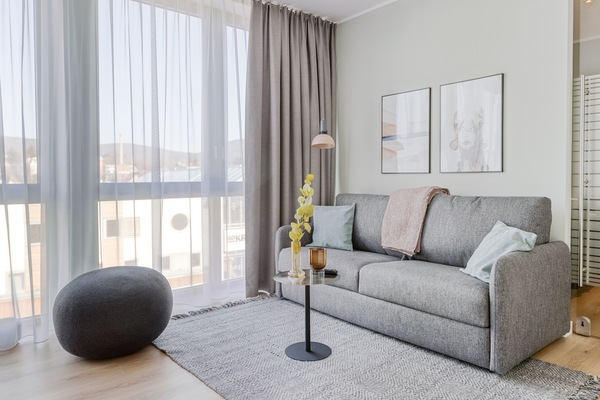 One-Bedroom Suite L | Living area | 50-inch Smart TV with satellite channels, TV