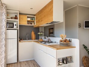 Microwave, stovetop, dishwasher, coffee/tea maker