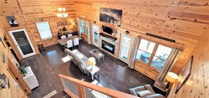 Smart TV, fireplace, books, music library