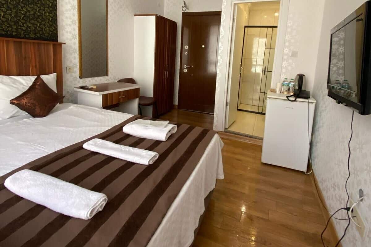 Deluxe tweepersoonskamer | 2 slaapkamers, luxe beddengoed, een minibar, een bureau