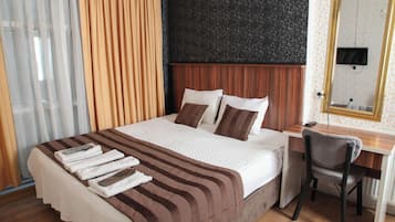 Premium bedding, minibar, desk, blackout curtains