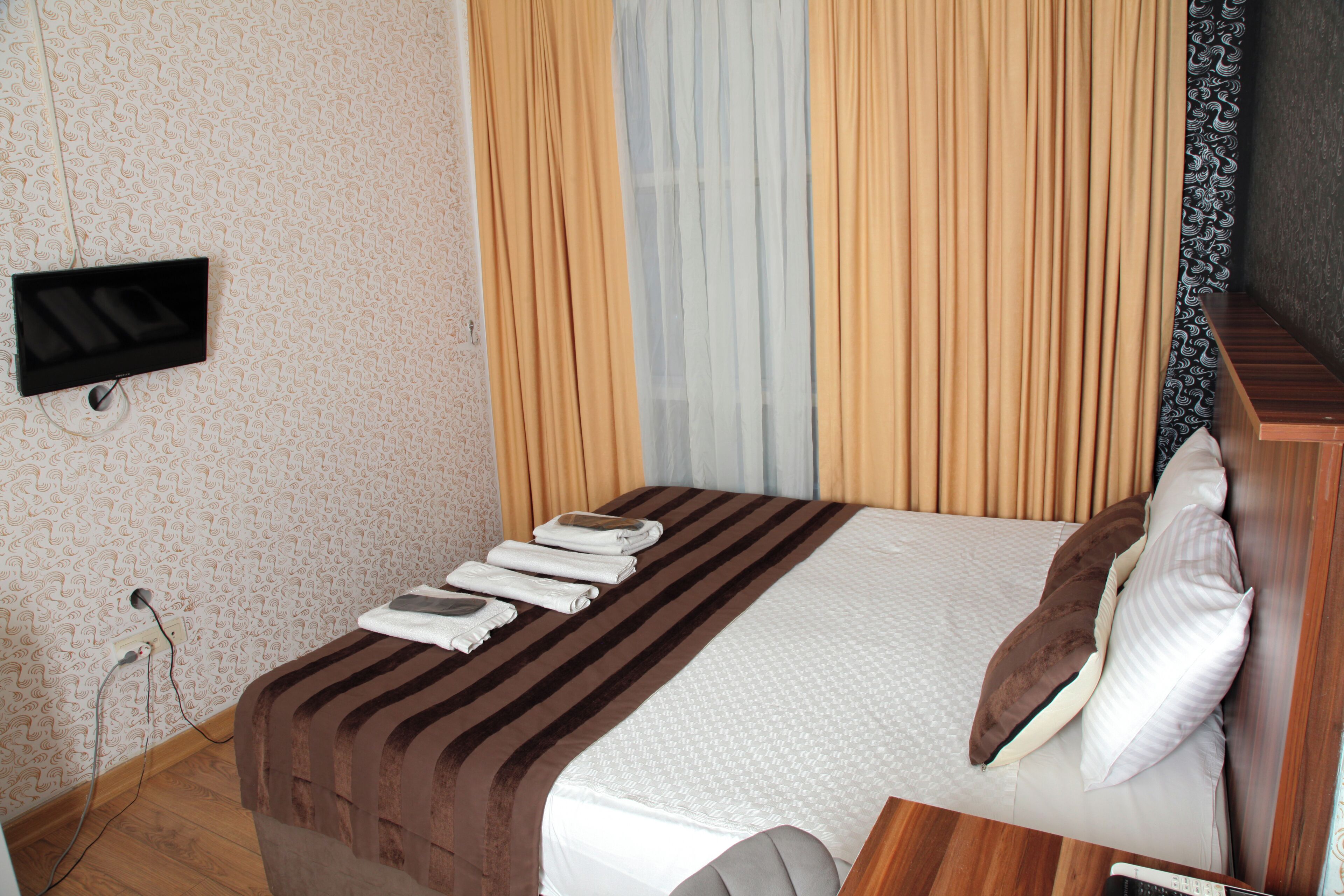 Deluxe Room, 2 Bedrooms | Premium bedding, minibar, desk, blackout drapes