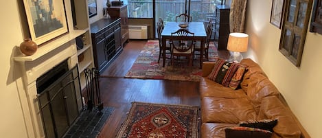 Smart TV, fireplace, books, offices