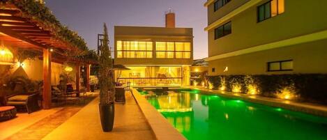 Outdoor pool, open 9:00 AM to 9:00 PM, free cabanas, pool umbrellas