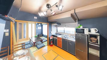 Family Villa | Private kitchen | Full-size fridge, microwave, rice cooker, cookware/dishes/utensils