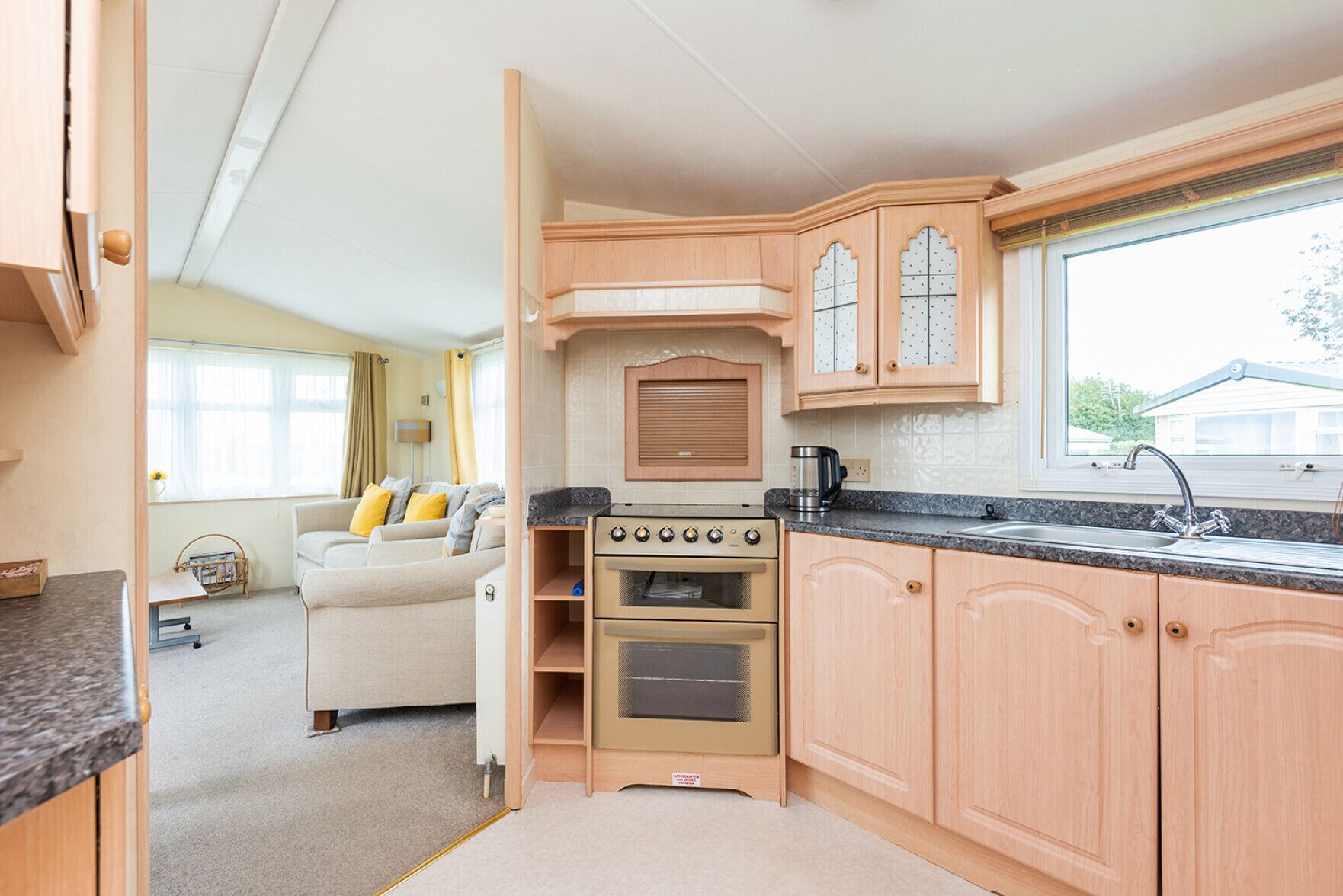 Fridge, oven, toaster, dining tables