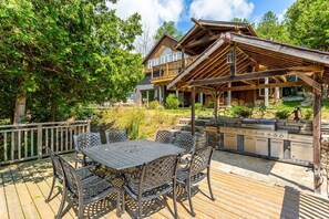 Outdoor dining - Large cottage with Water front, Heated Pool, sauna, 4 family rooms (Fergus)