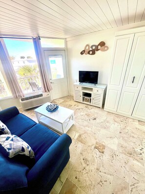 TV, offices - Coastal Cozy - Ocean View at Symphony Beach Club (Ormond Beach)