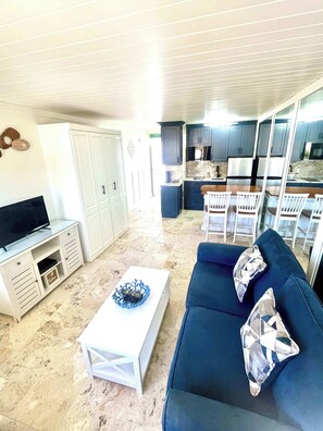 TV, offices - Coastal Cozy - Ocean View at Symphony Beach Club (Ormond Beach)