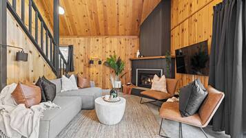 TV, fireplace, books, offices