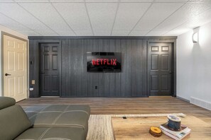 TV, fireplace, books, offices