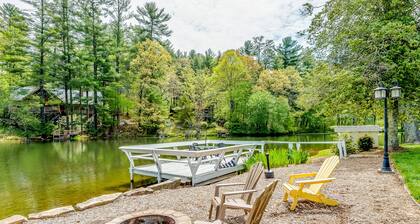 Lakefront corner condo with canoes, resort pool, tennis & firepit - dogs welcome