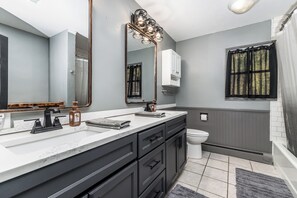 Combined shower/bathtub, hair dryer, towels, soap