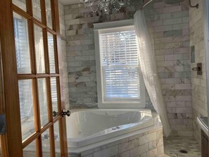 Shower, jetted tub, hair dryer, towels