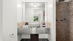 Bathtub, hair dryer, towels