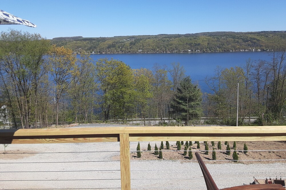 Stunning site with amazing decks, hot tub, walk to private beach on Keuka Lake!