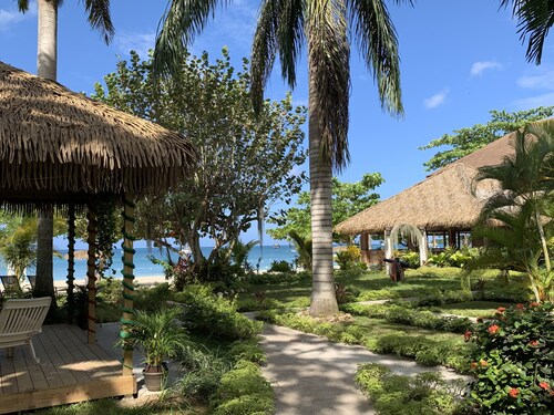 Relax in Jamaica - Enjoy 7 Miles of White Sand Beach! by RedAwning