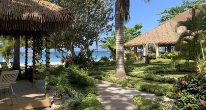 Relax in Jamaica - Enjoy 7 Miles of White Sand Beach! by RedAwning
