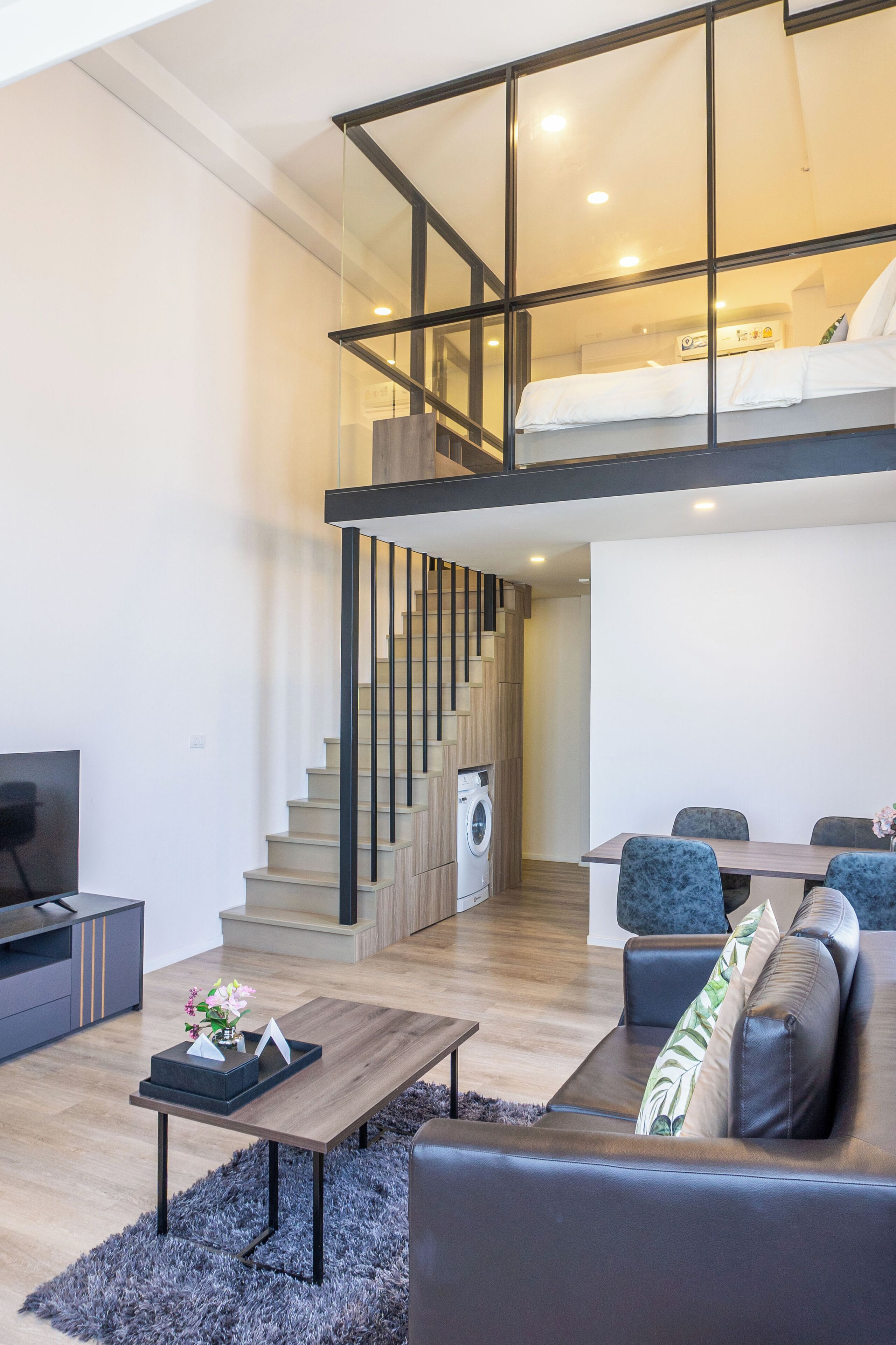 studio executive duplex twin | living area | flat-screen tv, dvd player