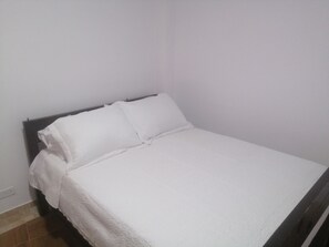 Apartamento familiar | 2 dormitorios y tabla de planchar con plancha