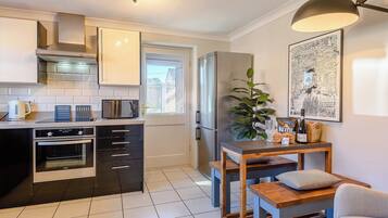 Oven, dishwasher, highchair, cookware/dishes/utensils