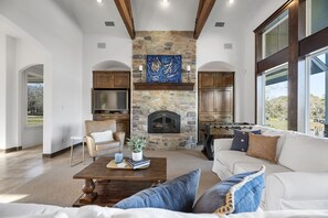 TV, fireplace, table football, books