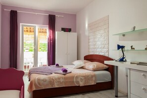 2 habitaciones, tabla de planchar con plancha y acceso a internet 