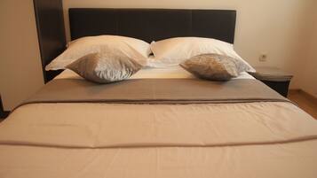 2 dormitorios, tabla de planchar con plancha, wifi y ropa de cama