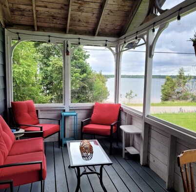 Quaint 2 bedroom water view cottage.  Near great golfing, beaches and breweries.