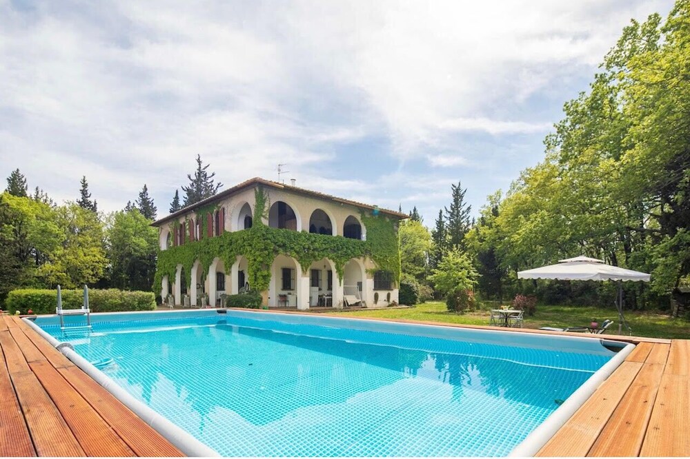 Splendid Villa In Tuscany Lined with Cypress Tree