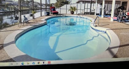 Canal Home 3Br 2BA with Salt Water Heated Pool and Boat DockDiscounts Available