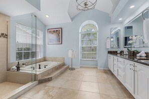 Combined shower/bathtub, towels - River View, Heated pool - Serenity & Sunrises - Roelens Vacations (Cape Coral)
