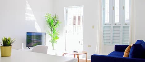 Basic Room, 2 Bedrooms | Living area | 25-inch Smart TV with digital channels, TV, streaming services