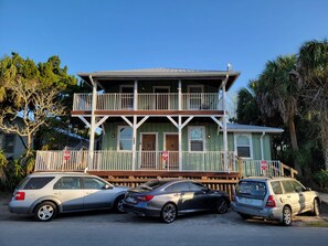 Two-story building with a balcony on the upper level, offering an outdoor space.