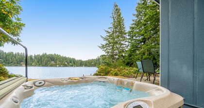 Waterfront retreat with lake views & private hot tub
